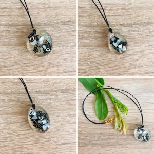 Pendentifs résine paillettes noir et jaune pâle